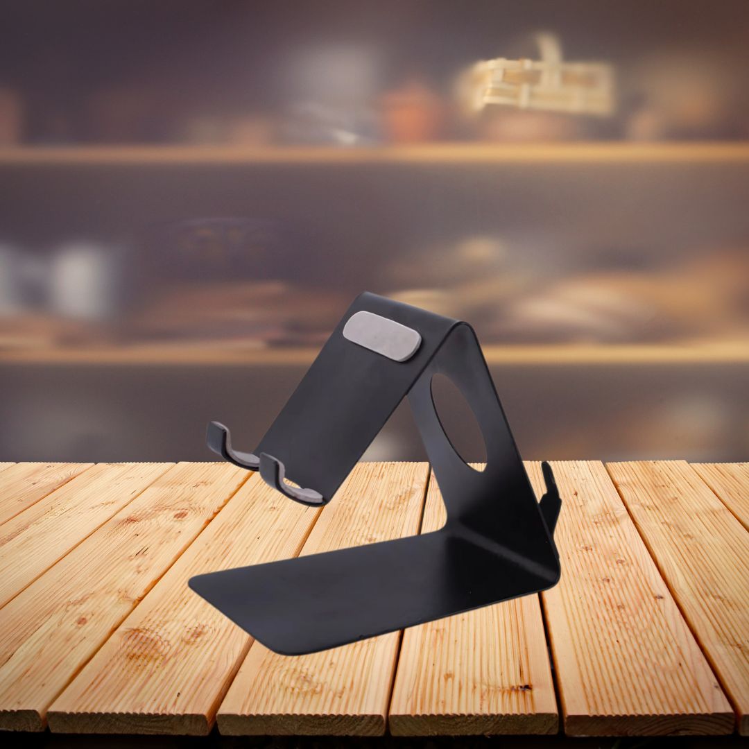 Black mobile stand with smartphone and pens in detachable tumbler