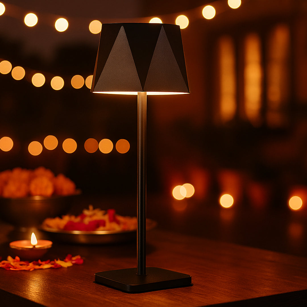 DuneLume rechargeable metal table lamp in black with geometric shade on a wooden table
