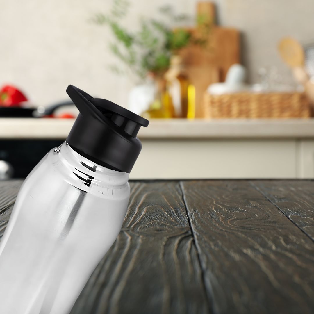 Stainless steel curvy water bottle 1L natural silver with black BPA-free cap, product shot
