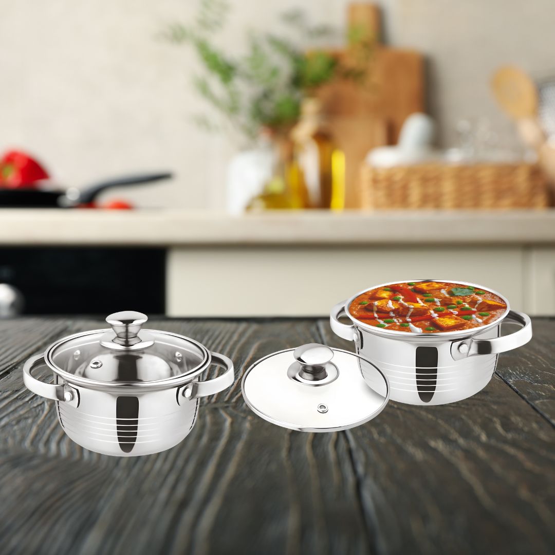 Premium stainless steel casserole set with glass lids in a kitchen setting