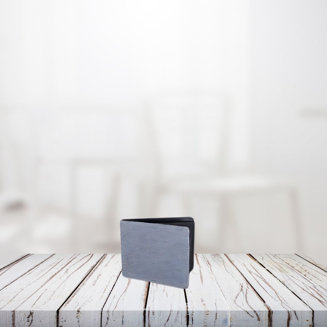 Gray canvas wallet on wooden surface