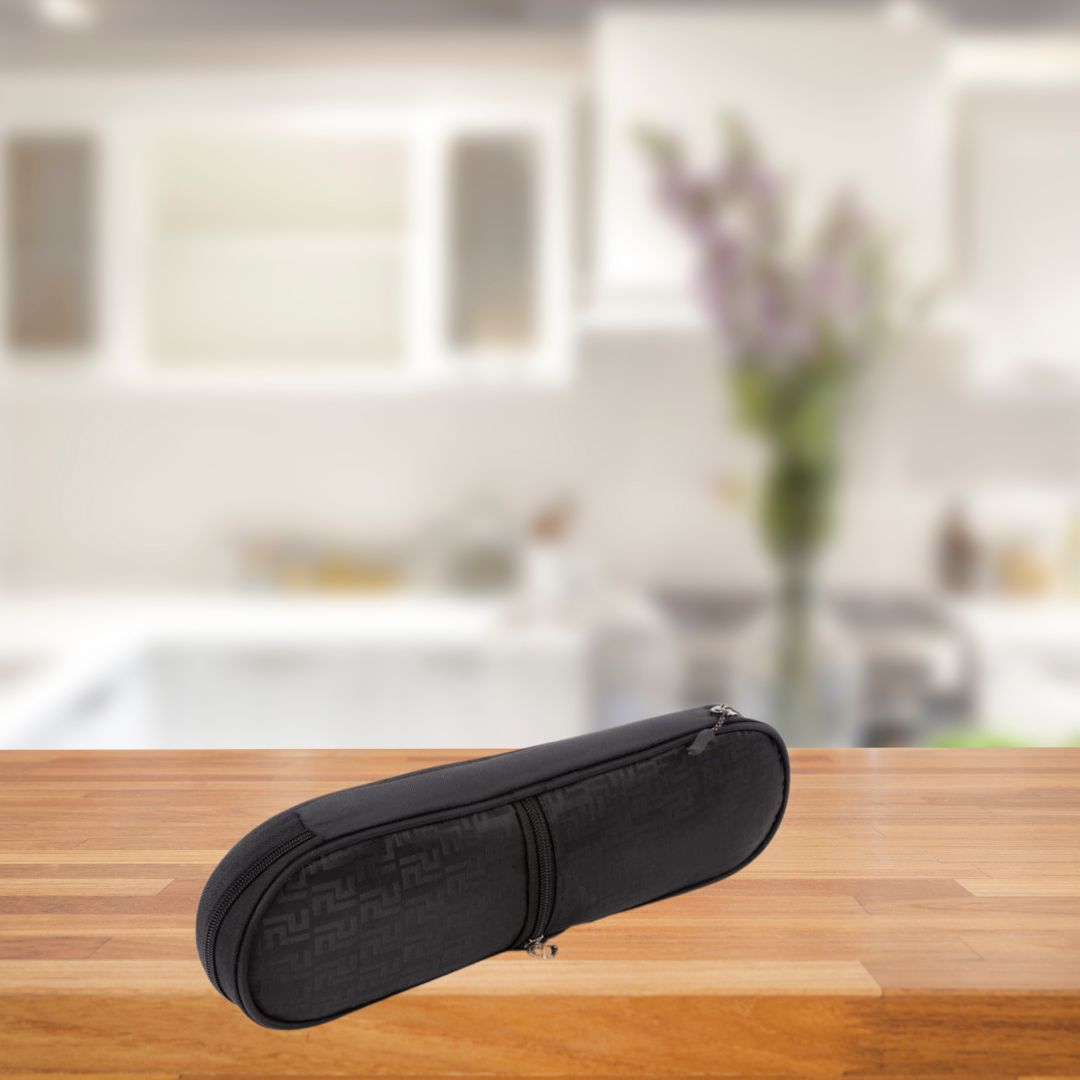 Folded black shopping bag in compact zippered case