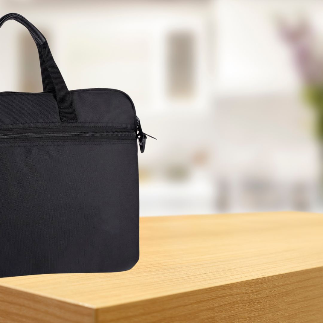 Back view of black laptop sleeve with zipper pocket
