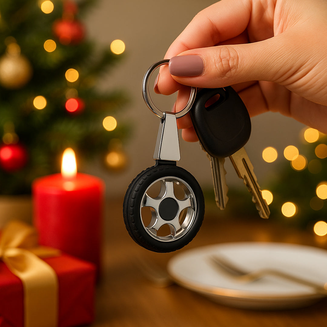 Tyre shape rotating keychain in hand with chrome finish