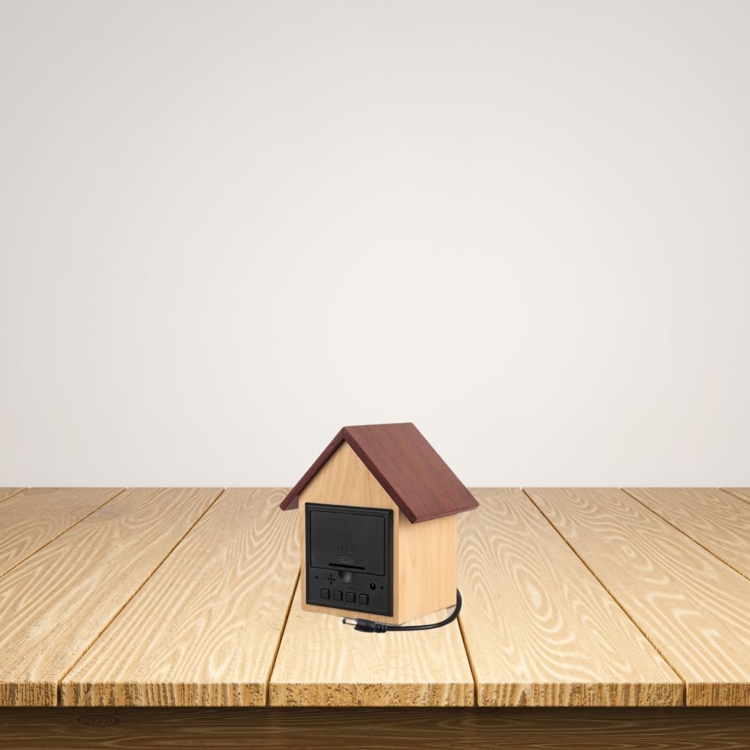 Back view of hut shape wooden LED clock with USB cable