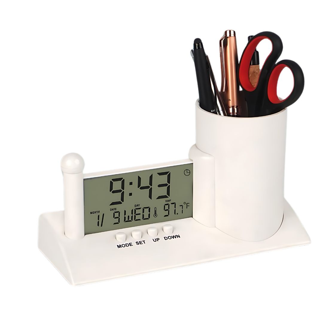 Digital clock with pen stand showing time, date, and temperature – front view