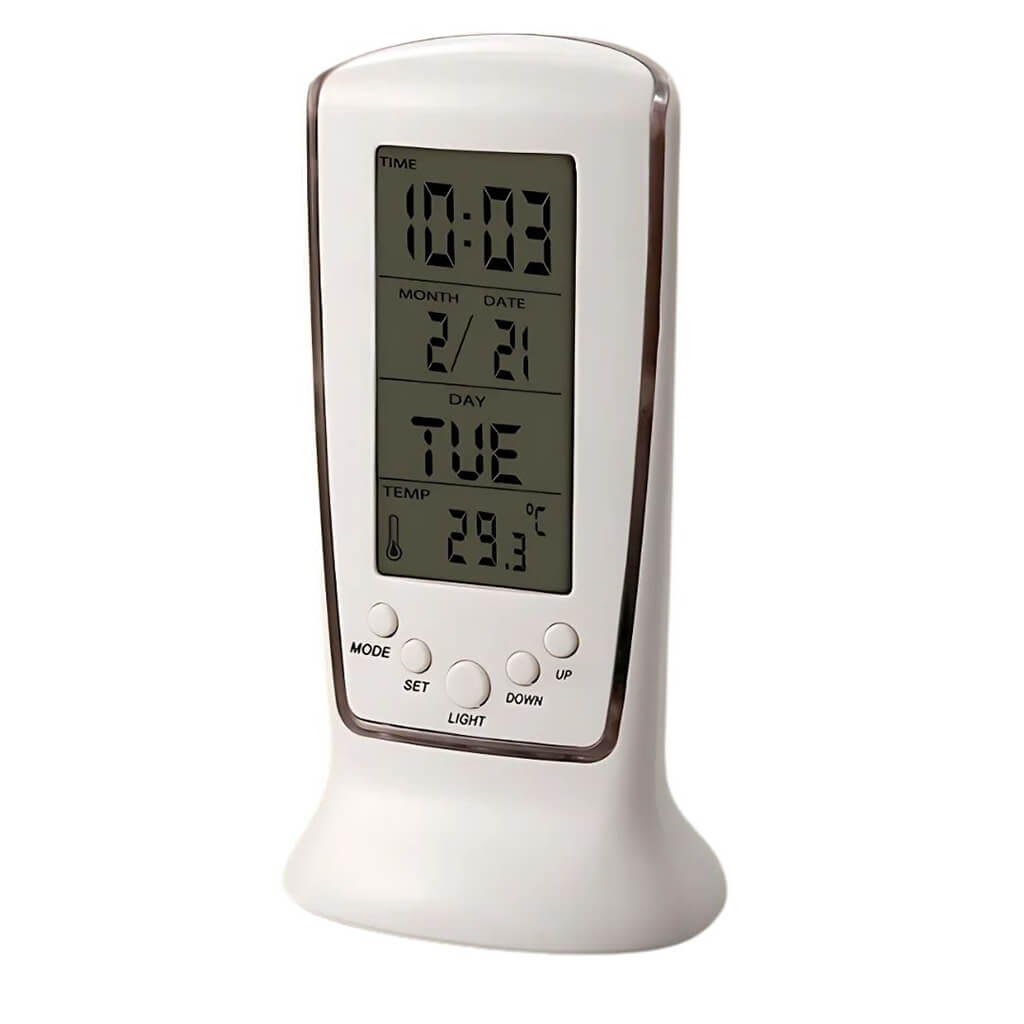 Backlit digital table clock with LCD display showing time, date, day, and temperature