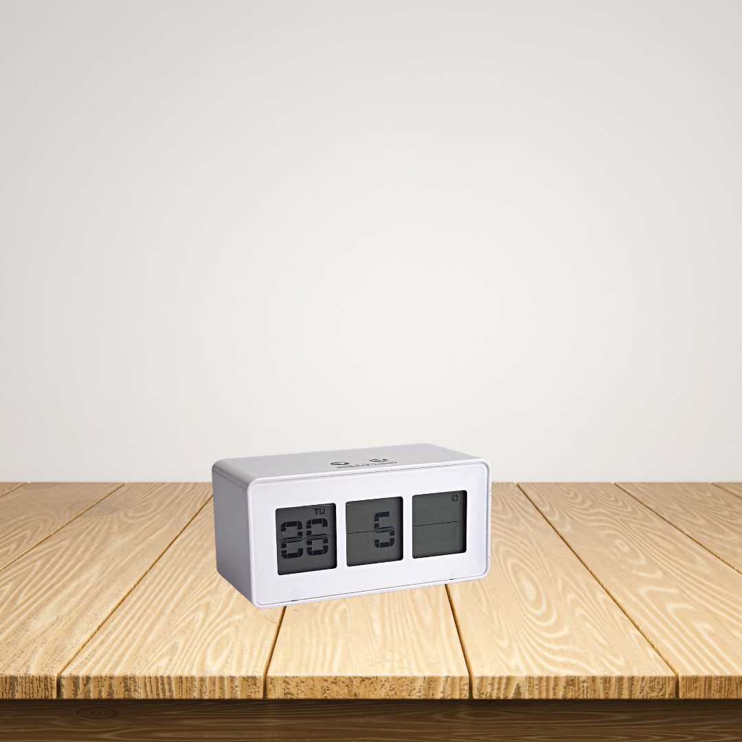 Close-up of flip display digital clock with touch panel