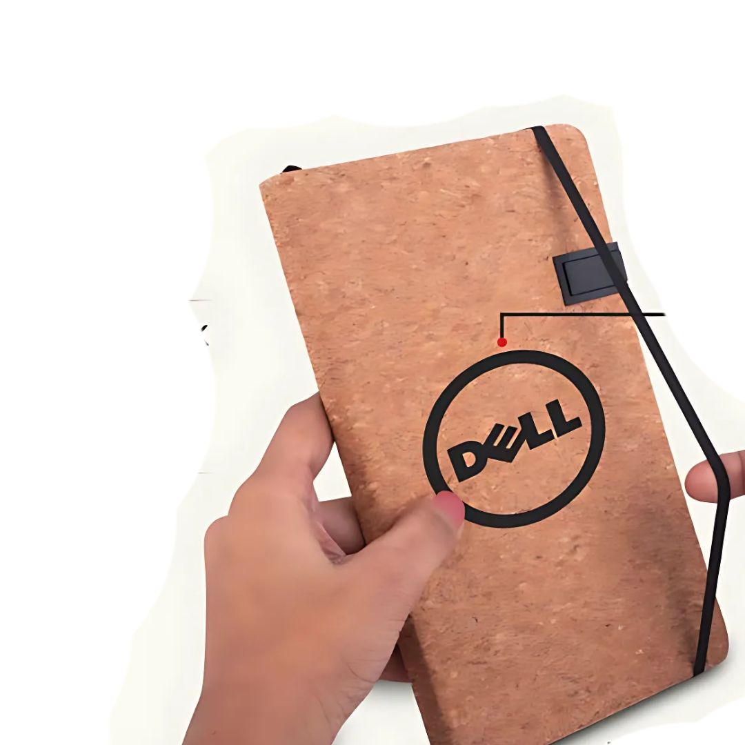 Eco-friendly cork A5 notebook with elastic strap, shown in hand