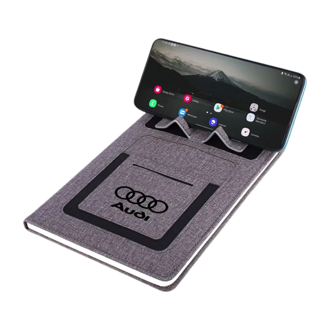 Open view of A5 notebook showing phone stand and writing pages