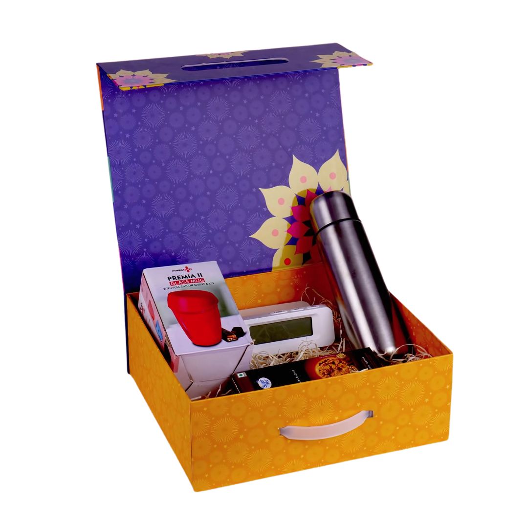 Premium gift set items – flask, digital clock with wireless charger, glass mug, and sugarfree cookies