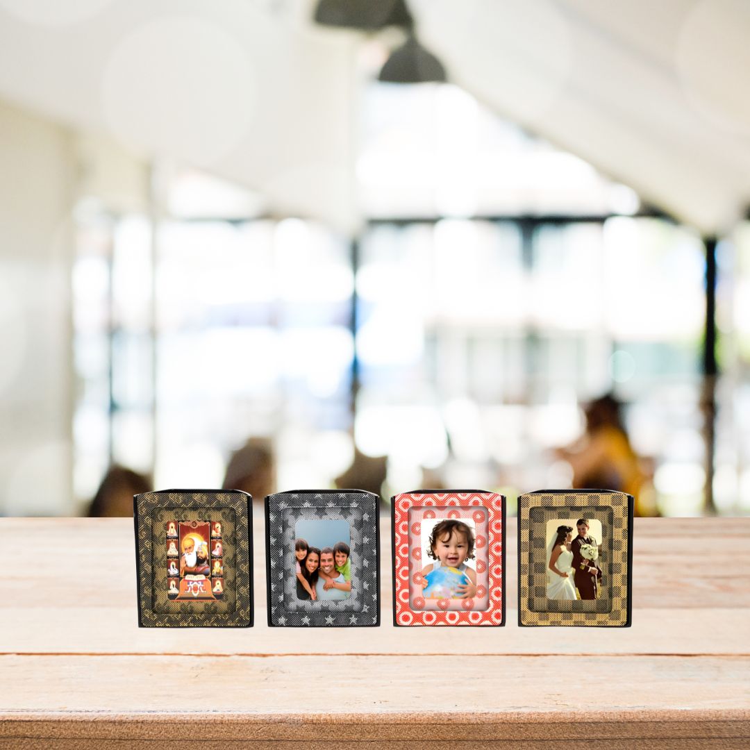 3D photo frame tumblers in assorted designs on wooden table
