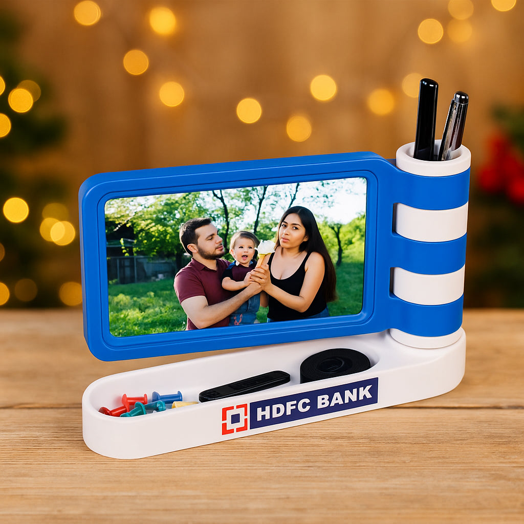 Flag style photo frame with pen stand and stationery holder placed on a desk