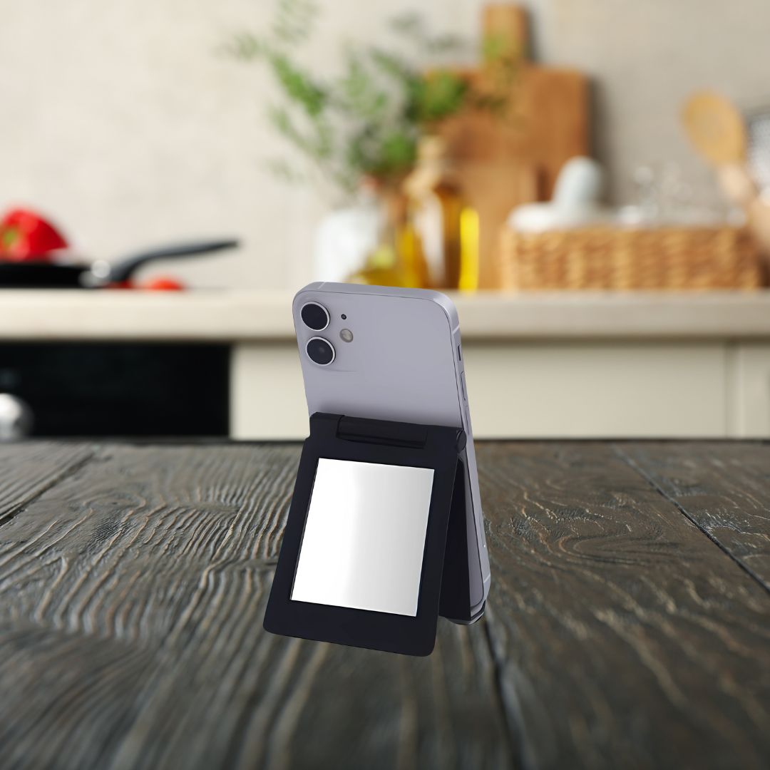 Mini folding mobile and tablet stand with built-in mirror in folded view