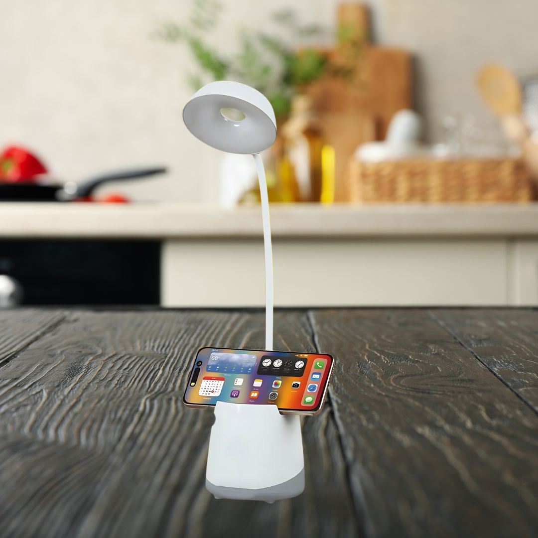 PenZen Sphere rechargeable lamp with phone stand on wooden table in lifestyle setup