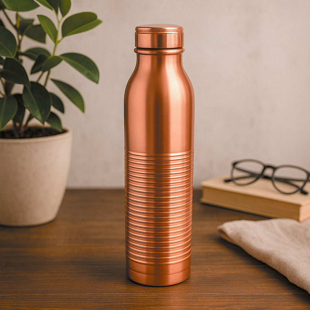 Premium 99% copper water bottle with ribbed design, 750ml capacity