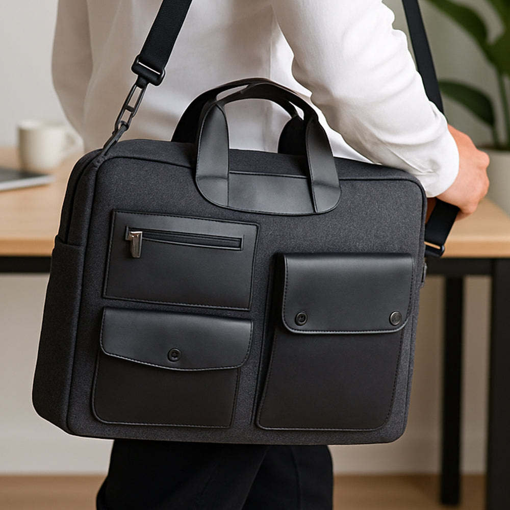 Portfolio sling bag in grey felt with black leather pockets, perfect for office and travel use