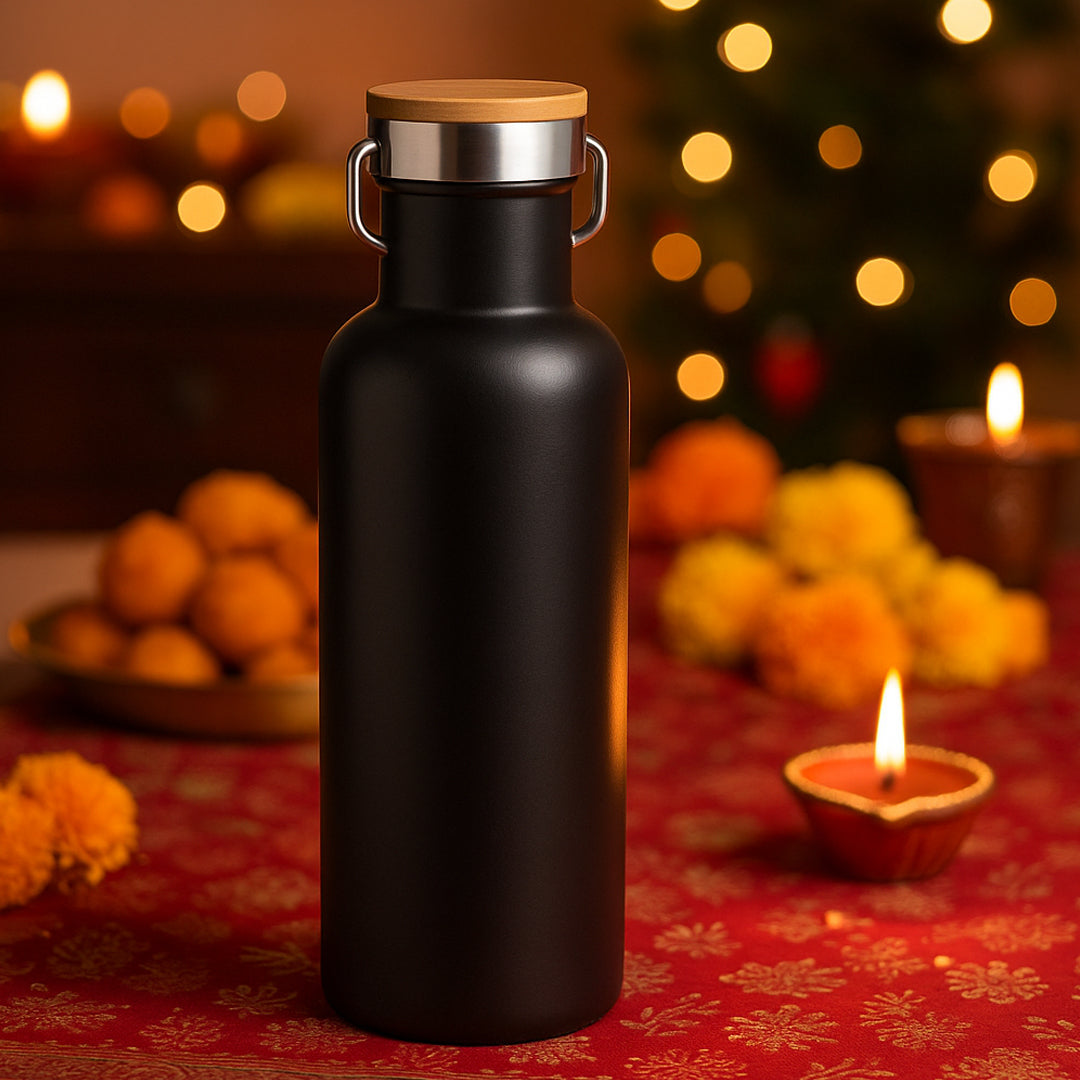 EcoVault 700 vacuum flask with bamboo lid displayed on wooden table