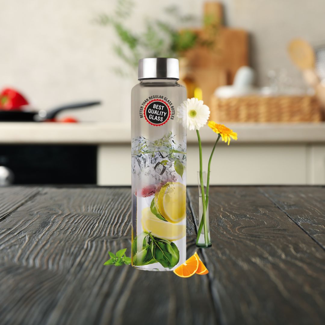 Clear borosilicate glass bottle with fruit infusion, lifestyle kitchen setup