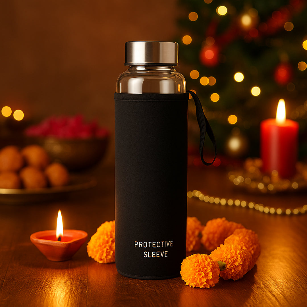 Borosilicate glass water bottle with protective sleeve and steel cap