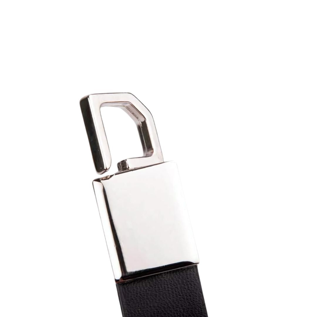 Close-up view of rectangle metal keychain with PU strap