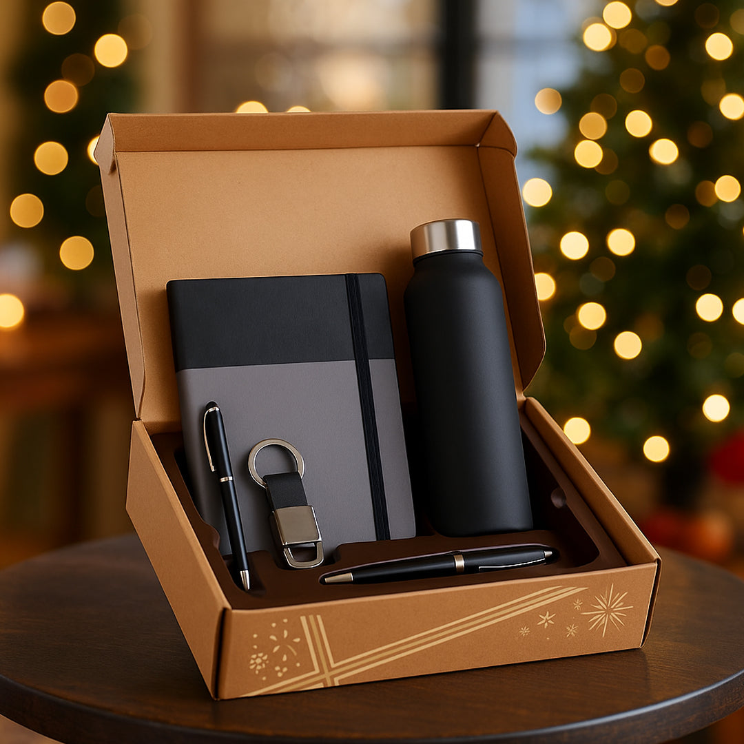 4-in-1 gift set with notebook, bottle, pen, and keychain in kraft box