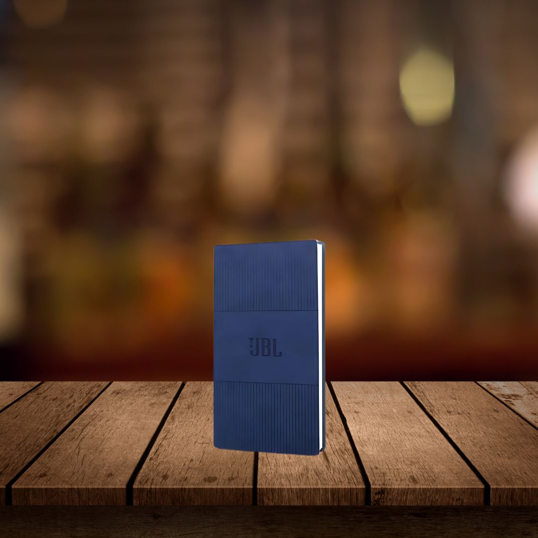 Blue A6 soft cover notebook displayed on wooden table