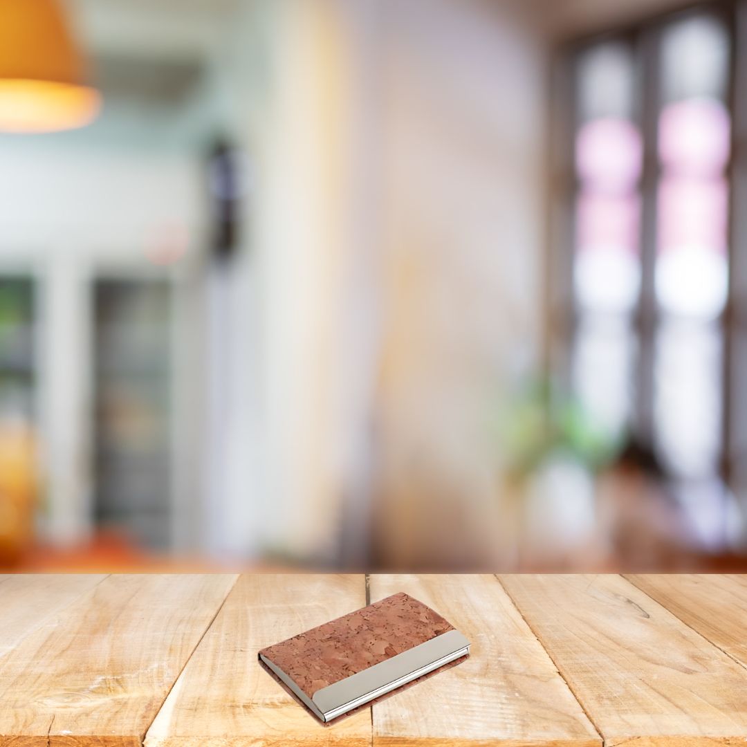 Eco-friendly cork visiting card holder on wooden table
