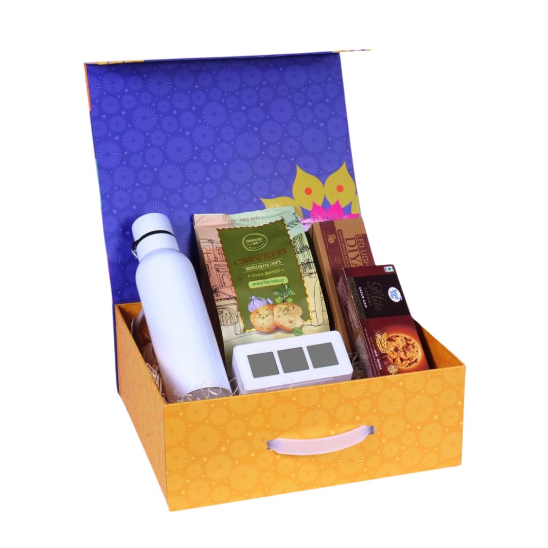 Festive celebration gift set in magnetic gift box with bottle, cookies, bruschetta, clock, and diyas