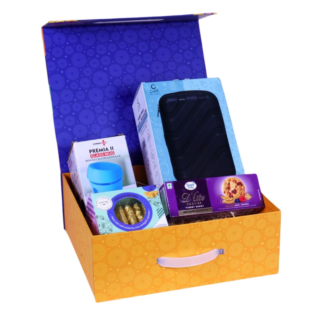 Premium celebration gift hamper open view with mug, organizer, and cookies
