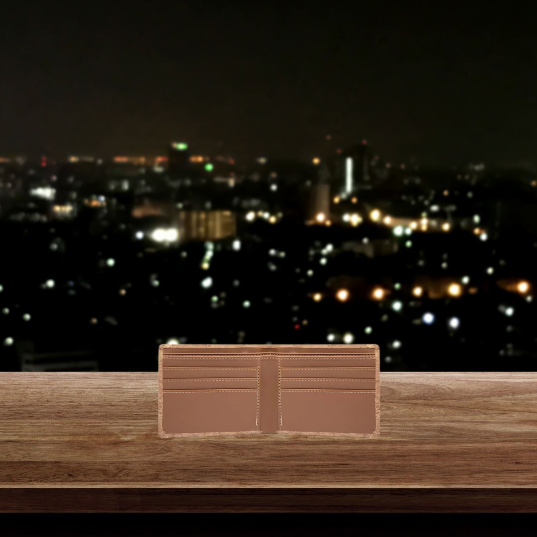 Open cork wallet showing compartments on wooden table