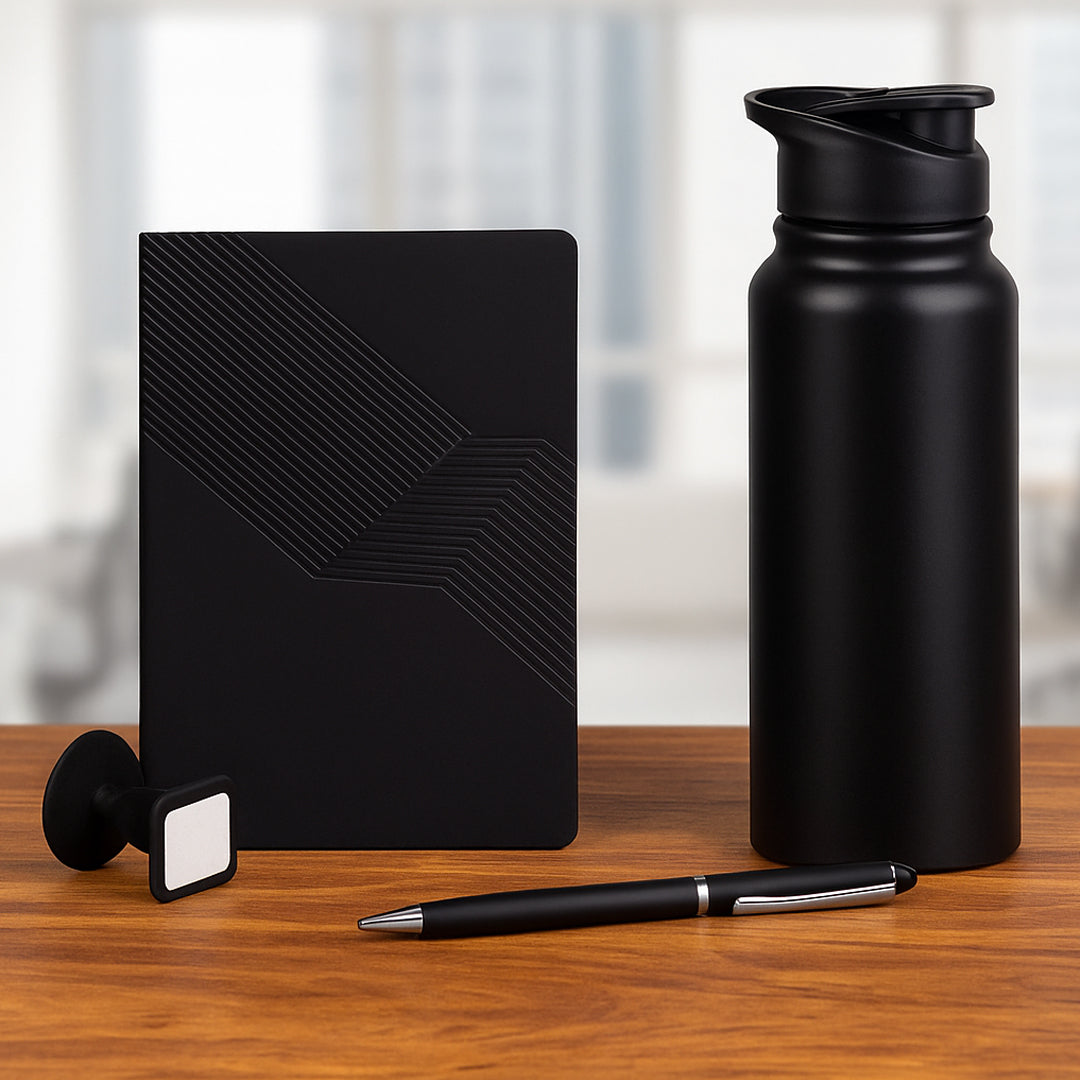 4-in-1 premium gift set with stainless steel bottle, notebook, pen, and mobile stand in box