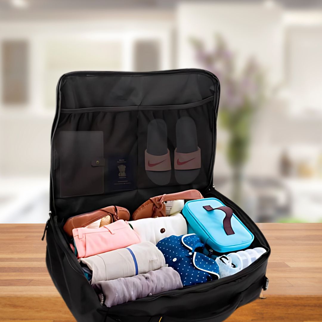 Overnighter travel bag open with clothes packed inside