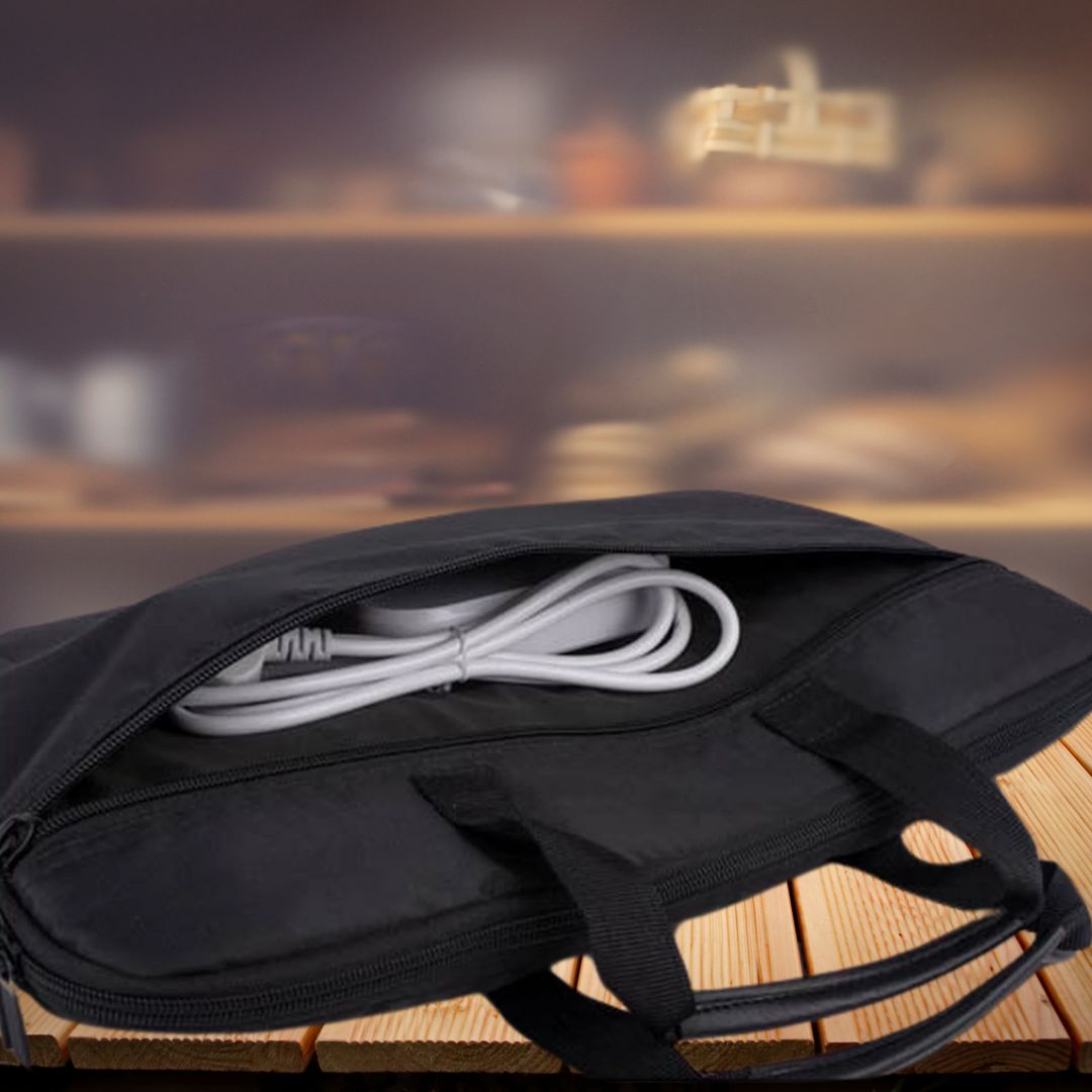 Black mini laptop bag open showing charger compartment