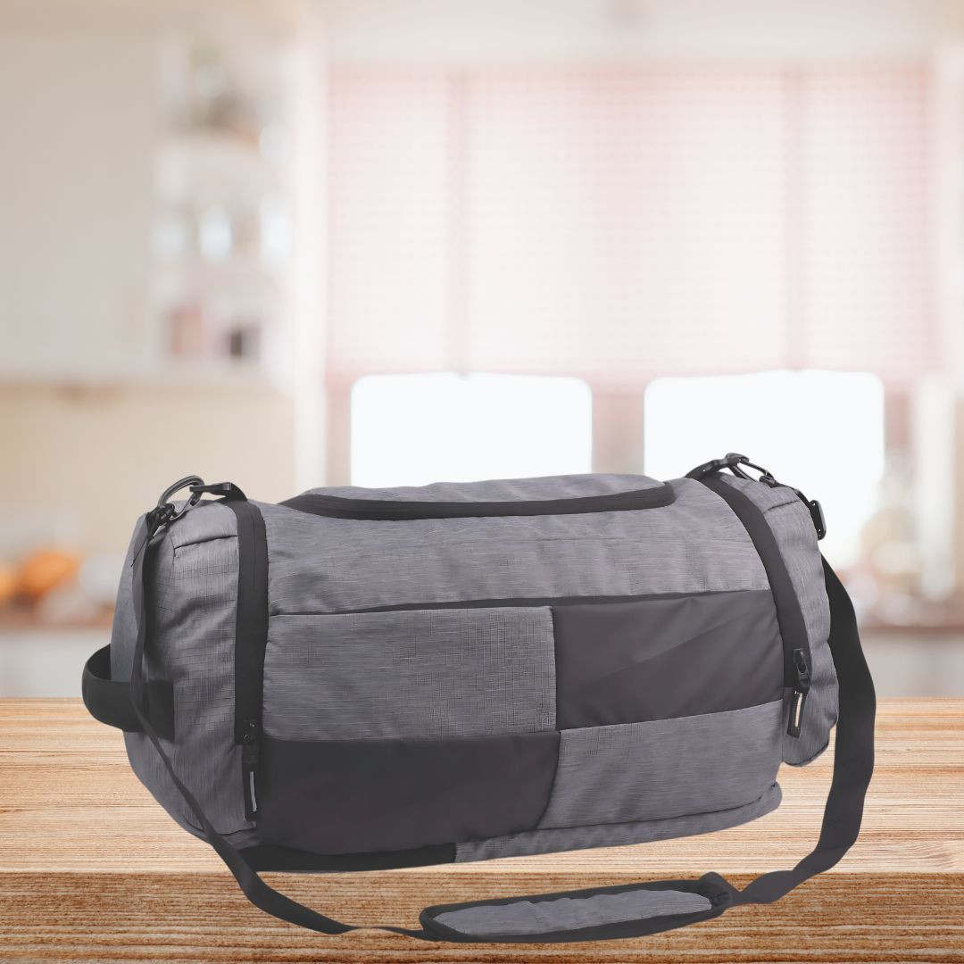 Premium grey checkered travel duffel bag on wooden table with shoulder strap