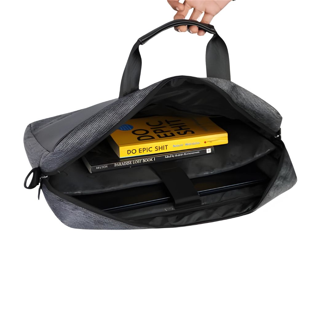 Open graphite laptop bag showing compartments for laptop, books and essentials
