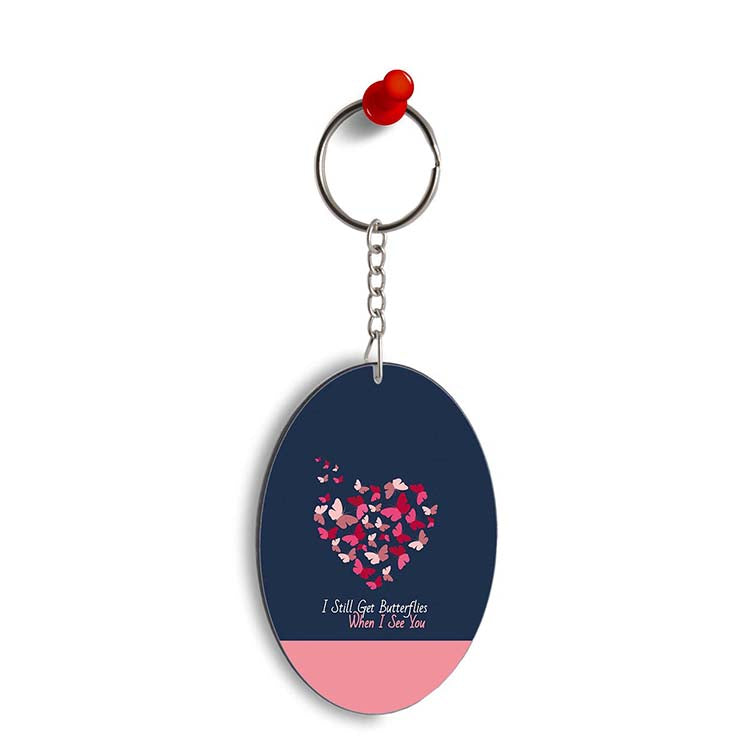 Butterflies on Seeing You Oval Key Chain