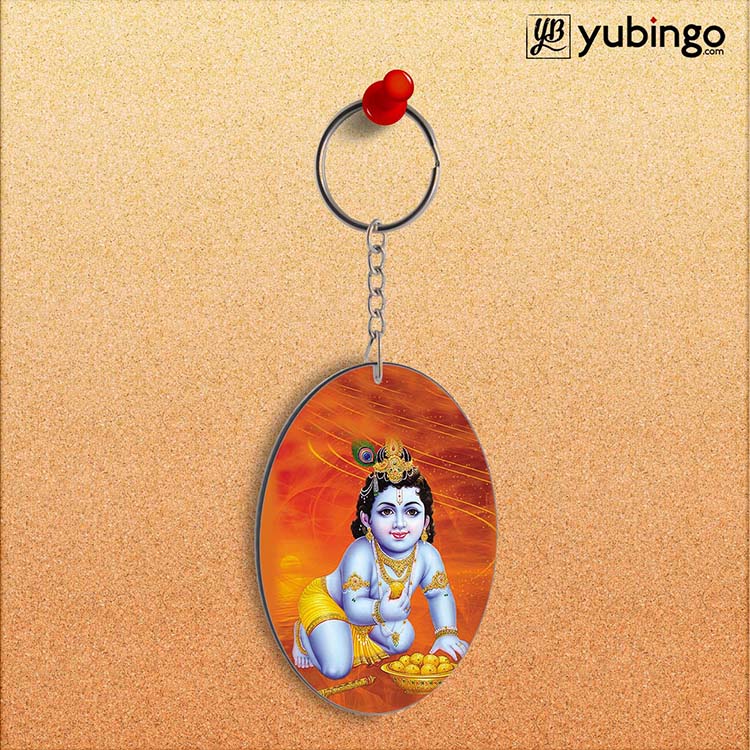 Krishna With Ladoos Oval Key Chain