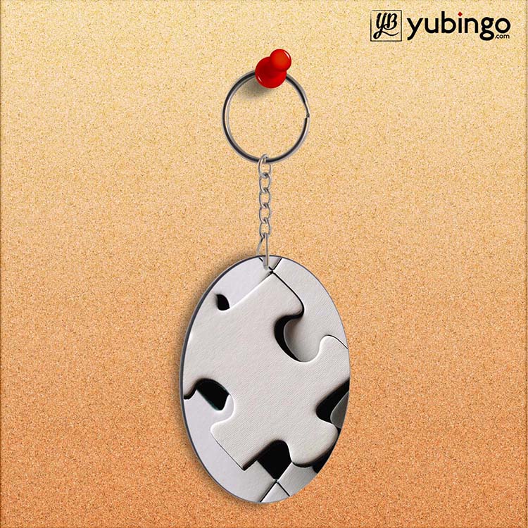 White Stylish Puzzle Oval Key Chain